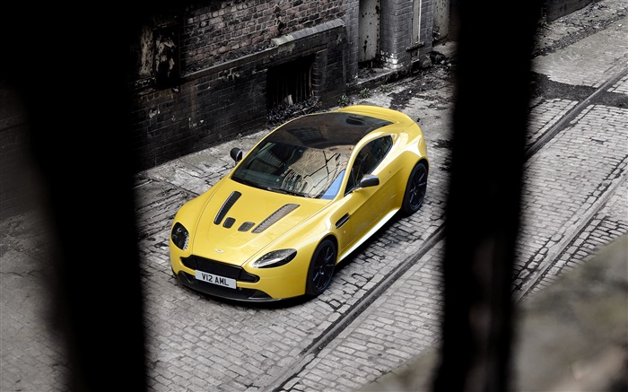 Aston Martin V12 Vantage S yellow supercar stop at street Wallpapers Pictures Photos Images