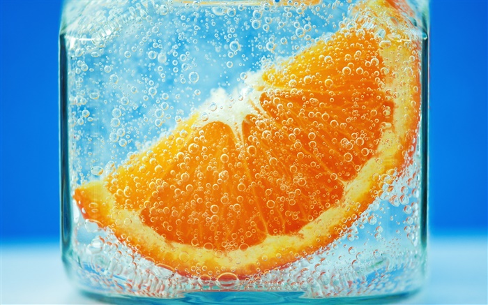 Orange slices in the water, blue background, bubble Wallpapers Pictures Photos Images