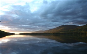 Cloudy sky, lake, mountain, dusk, water reflection