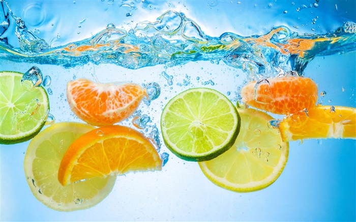 Fruit piece in water, citrus Wallpapers Pictures Photos Images