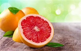 Grapefruit close-up, red, leaves, orange