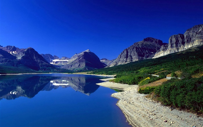 Mountains, lake, slope, blue sky, reflection Wallpapers Pictures Photos Images