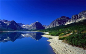 Mountains, lake, slope, blue sky, reflection HD wallpaper