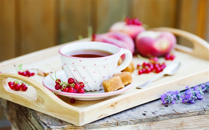 A cup of tea, red berries Wallpapers Pictures Photos Images