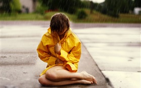 Girl sit at street, rain