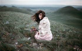 Girl in the wind, meadow, bouquet flowers, slope