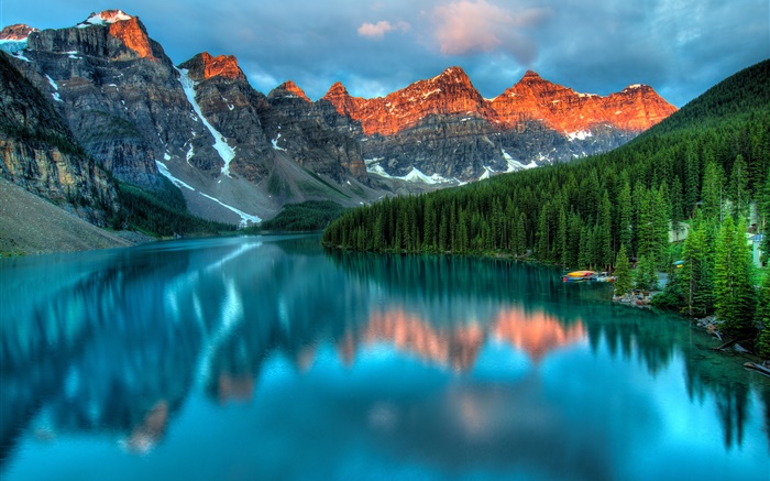 Mountains, lake, sunset, trees, water reflection, pier, clouds Wallpapers Pictures Photos Images