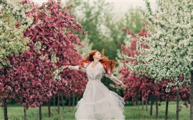 Red hair girl dance, flowers, trees, spring, bokeh