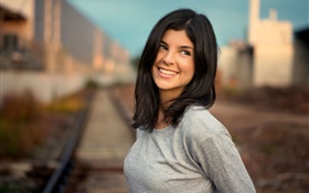 Smile girl, black hair, railway, bokeh HD wallpaper