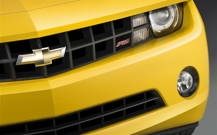 Chevrolet RS yellow car front view Wallpapers Pictures Photos Images