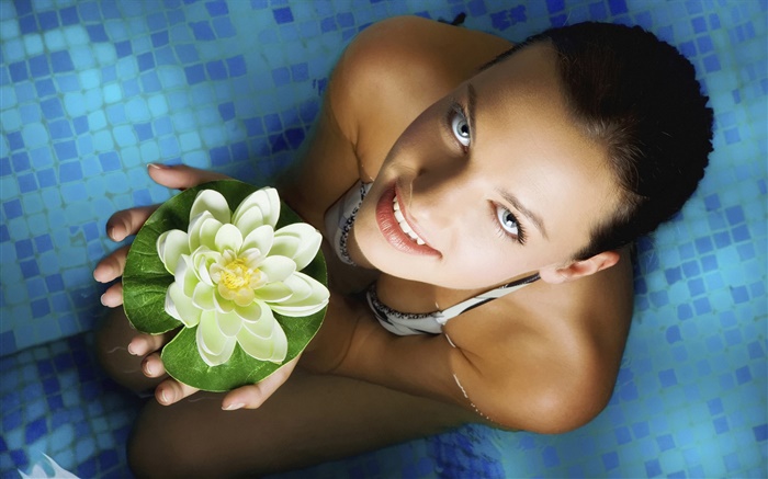 Girl holding water lily flower Wallpapers Pictures Photos Images
