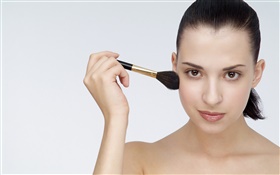 Girl use makeup brush HD wallpaper