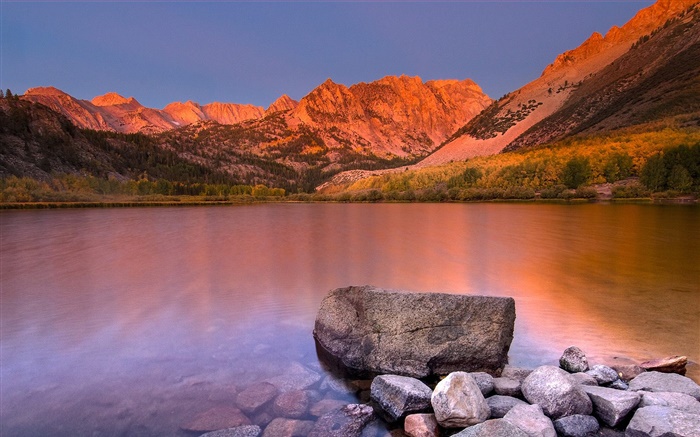 Lake, clear water, stones, mountains, dusk Wallpapers Pictures Photos Images