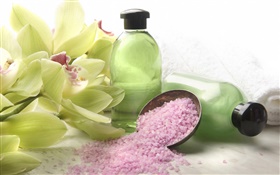 Orchid flowers, bottle, pink granules, SPA theme