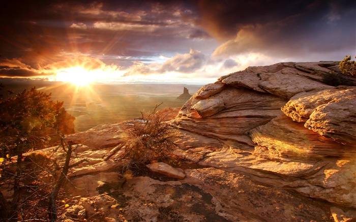 Rocks, mountains, clouds, sunset, sun rays Wallpapers Pictures Photos Images