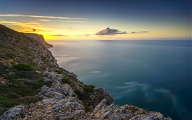 Rocks, sea, coast, sunset HD wallpaper