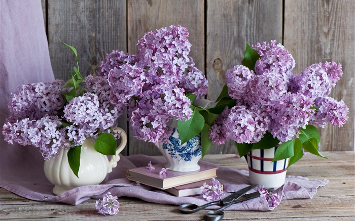 Vase, lilac, purple flowers, books, scissors Wallpapers Pictures Photos Images