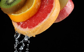 Fruit slice, apple, kiwi, orange, water HD wallpaper