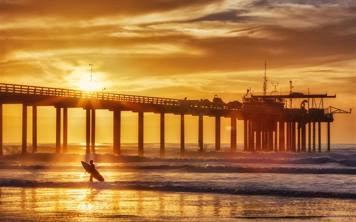 Sunset, coast, summer, pier, surfer, sea, waves Wallpapers Pictures Photos Images