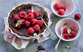 Chocolate tart, raspberries, tablespoons, still life