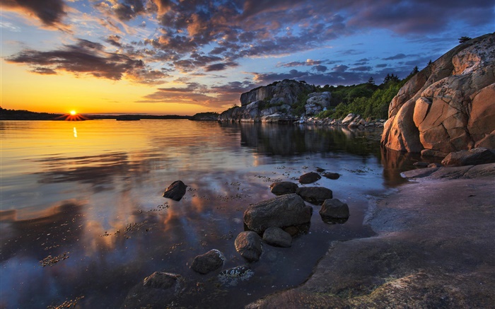 Coast sunset, sea, stones, rocks, clouds Wallpapers Pictures Photos Images