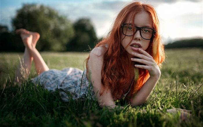 Red hair girl lying grass, glasses Wallpapers Pictures Photos Images