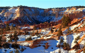 Winter nature landscape, snow, red rocks