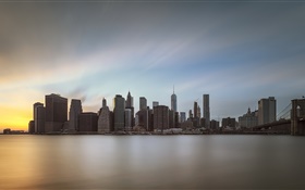 Manhattan, city at dusk, water reflection, USA